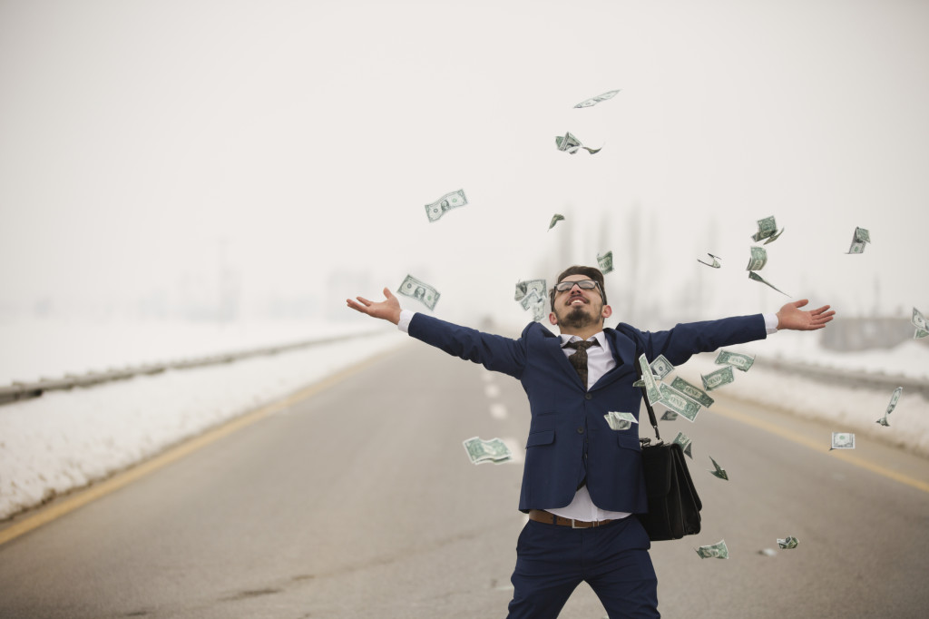 business-man-throwing-money-in-the-air-1024x682